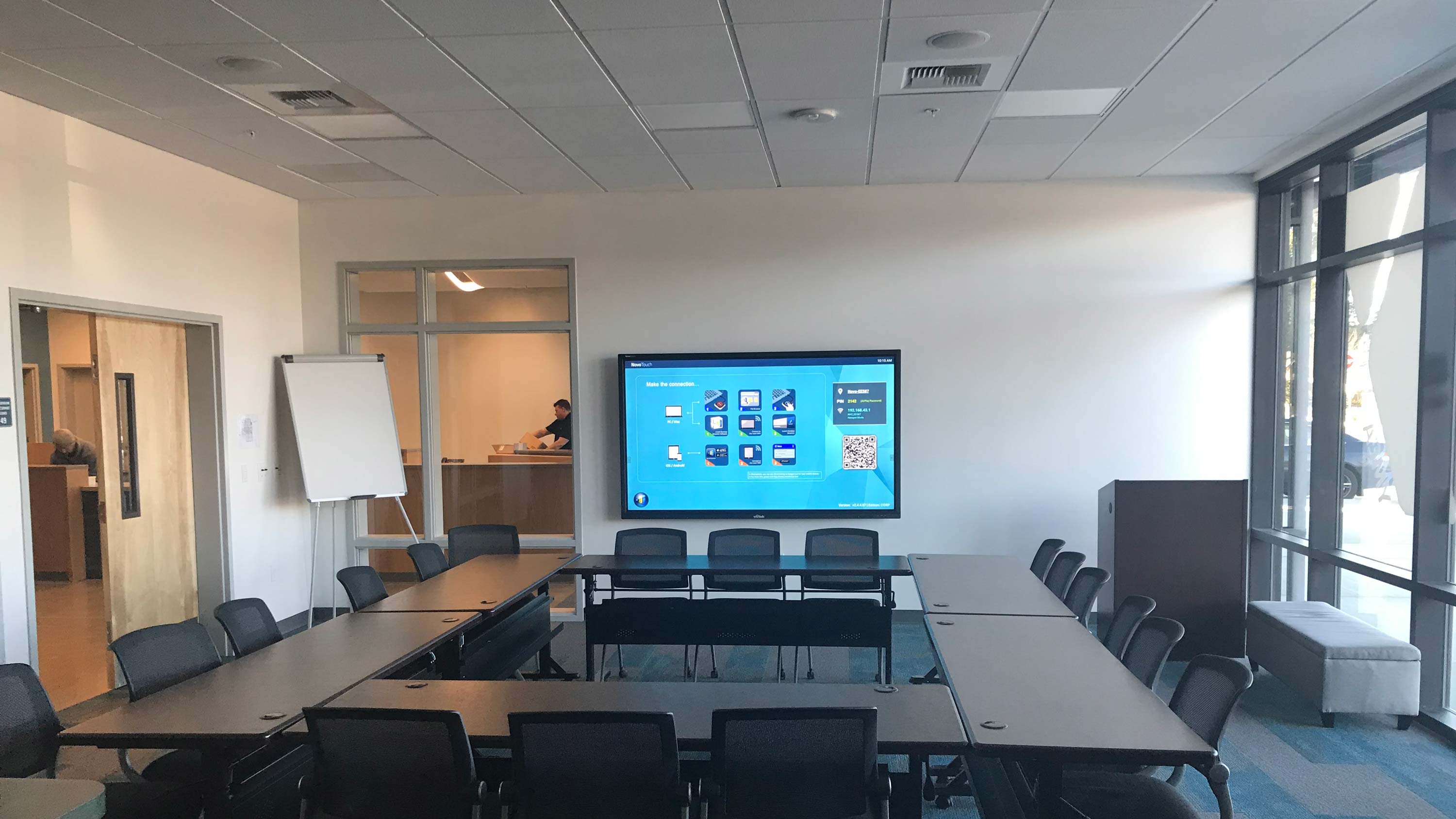training room, white walls and ceiling, whiteboard