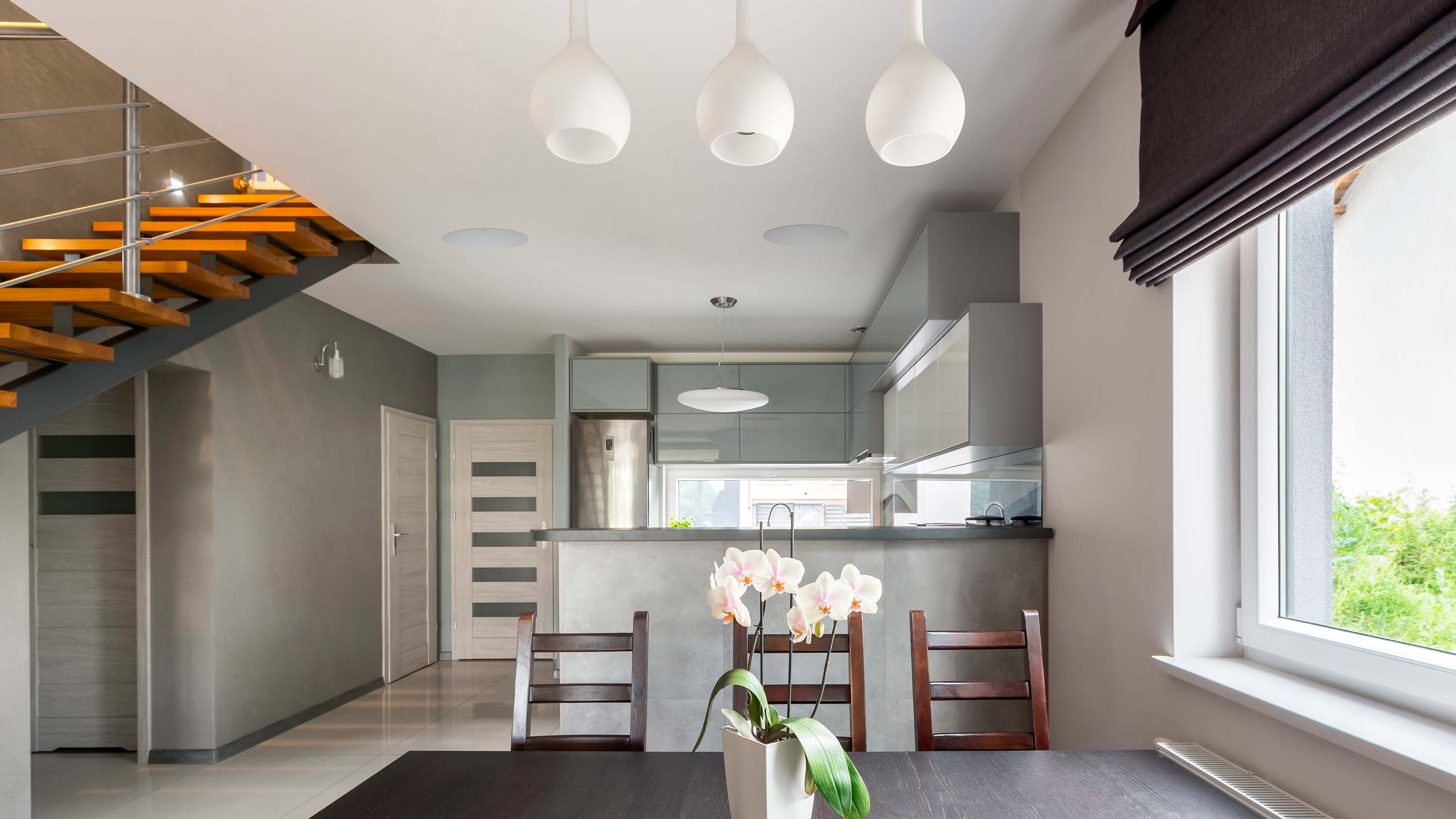 view of home, stairway, kitchen, open window