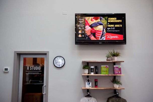 Waiting area with TV clock and shelves