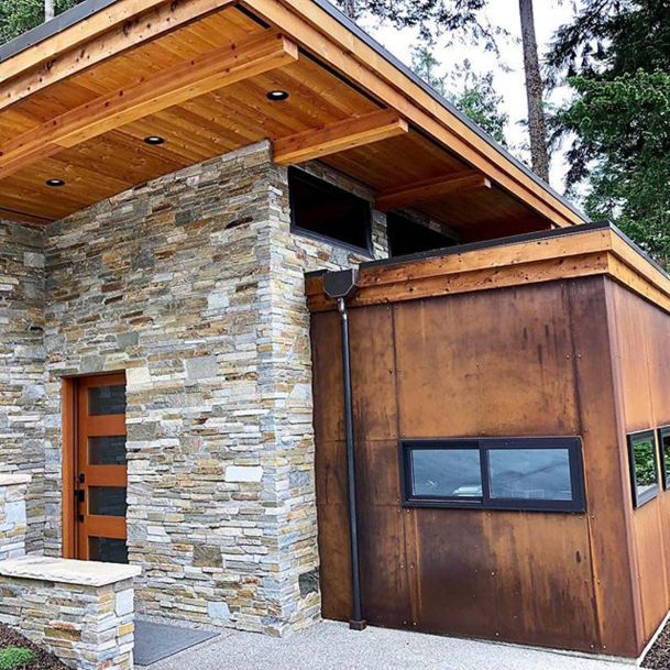 Outdoor view of home, wooden accents and brick walls