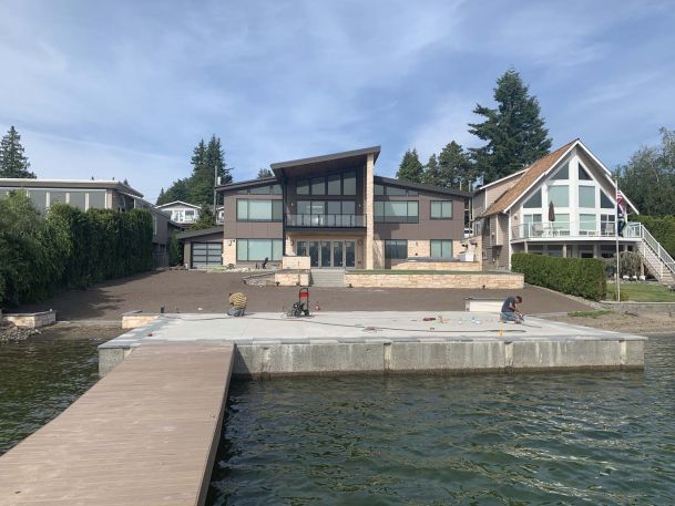 House on lake, yard work