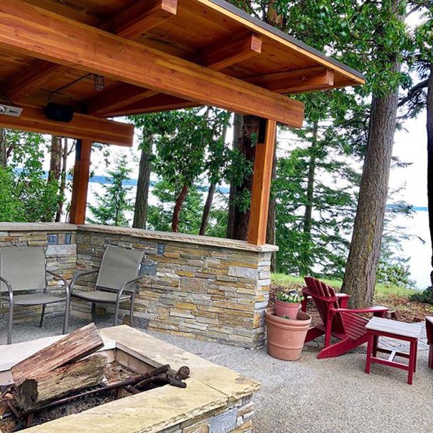 Outdoor seating area, stone and wooden beams