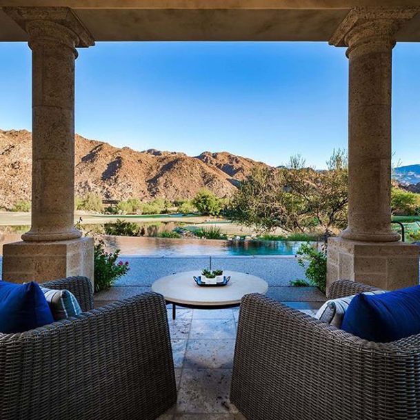 View of mountains between two columns